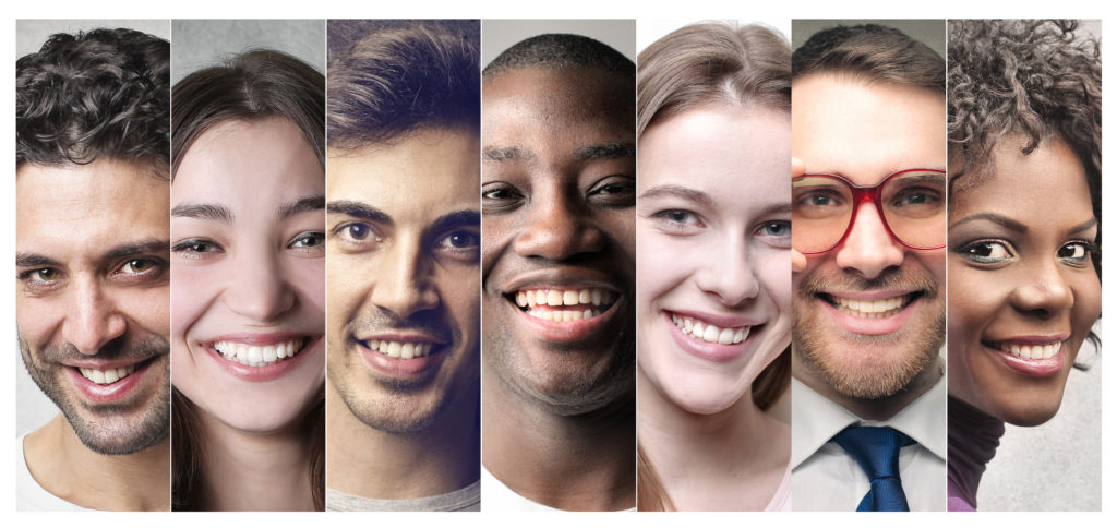 Portrait of different people smiling